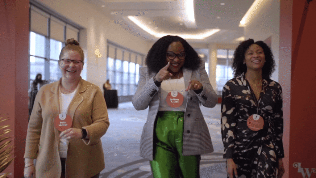 Business women walking at conference